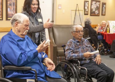 Two men playing wii in rehabilitation