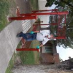 man standing on sharmar village bridge