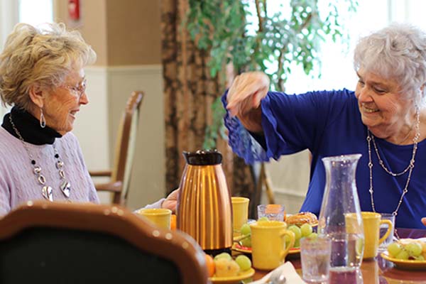 Two women eating a meal together